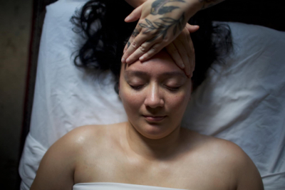 Marissa performing a head massage